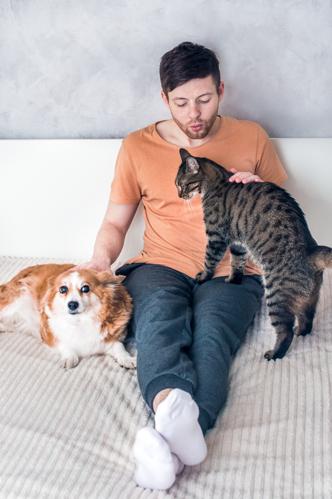 Men with his Cat & Dog in VITRA Apartments